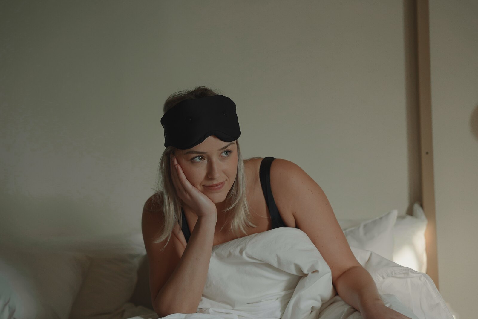 Real Resty contoured sleep mask photographed on a model