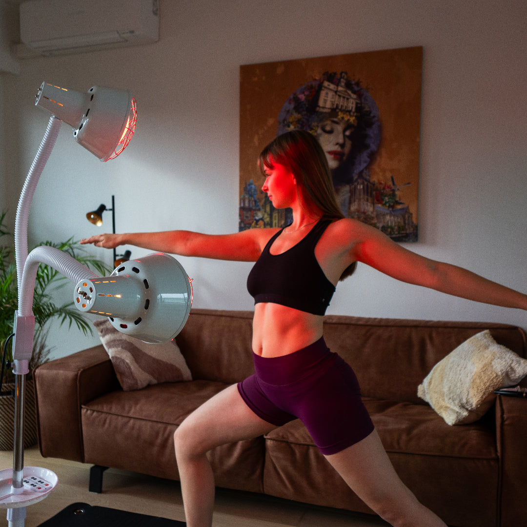 Person using the Resty double-head infrared heat lamp included in the Face & Body Light Routine Bundle