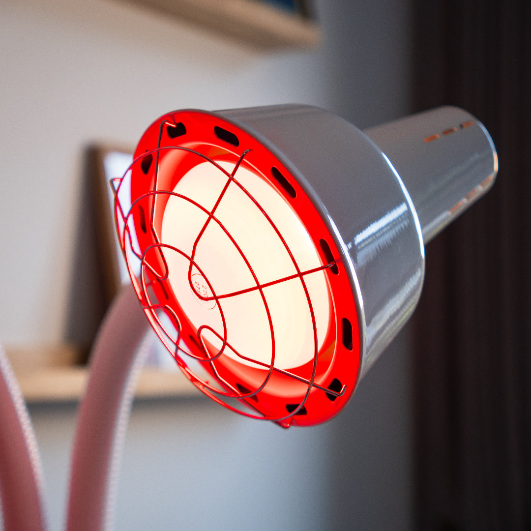 Resty infrared heat lamp glowing in the background